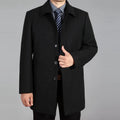 Men's mid-length woolen winter coat in dark grey with patch pockets and straight hem