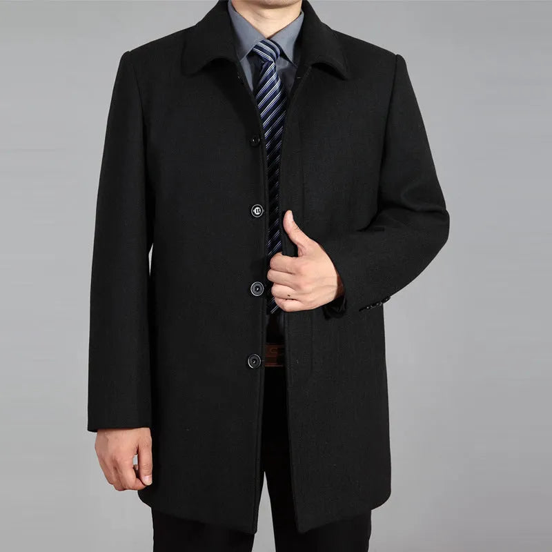 Men's mid-length woolen winter coat in dark grey with patch pockets and straight hem