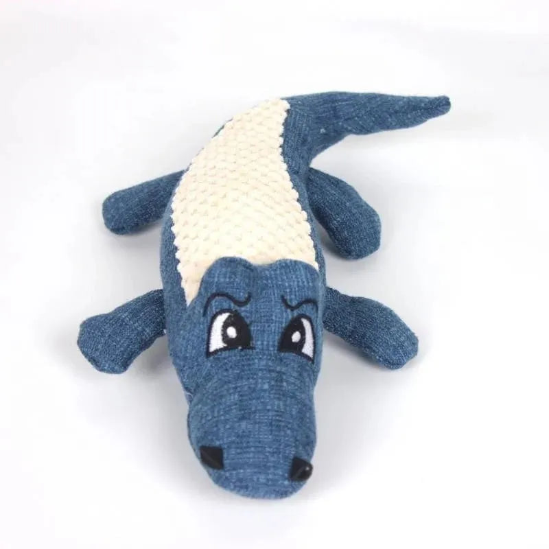 Blue, green, and red corn grid patterned plush toys for cats and dogs with a biting sound feature.