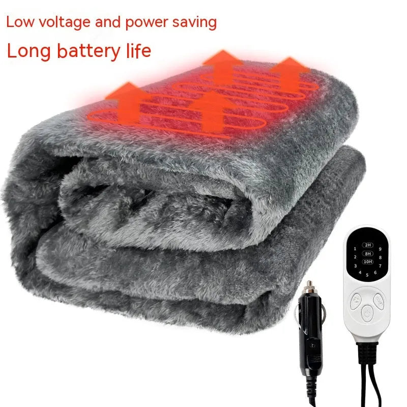 Grey 12V car electric blanket showing cigarette lighter plug connection and temperature controls
