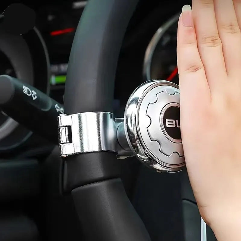 Universal metal steering wheel assist knob with steel ball bearing, shown in black, silver, carbon fibre, electroplating and wood grain colour options