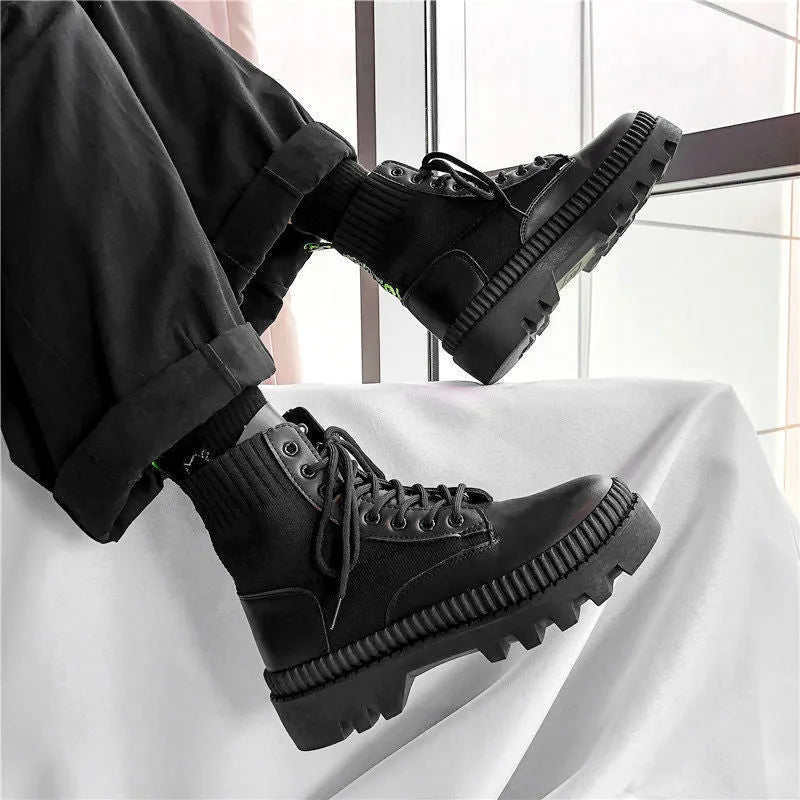 Men's black frosted leather platform ankle boots with a side zip and high-top design.