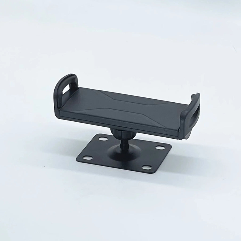 Universal alloy wall rack holding a tablet and a large mobile phone in vertical orientation