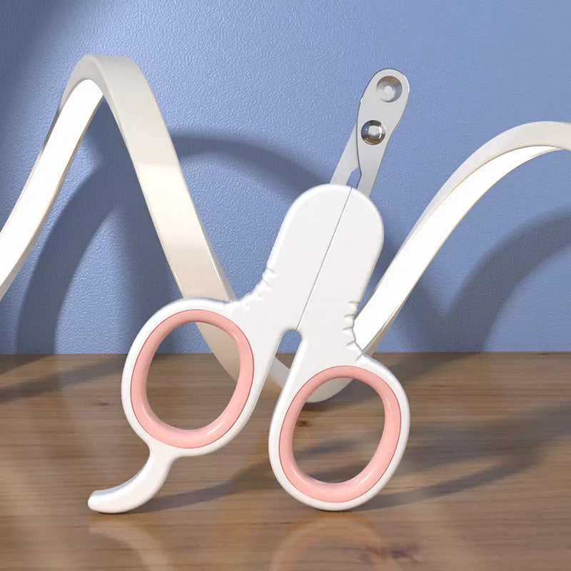 Professional grey and pink pet nail clippers with curved safety tips and a non-slip rubber handle.