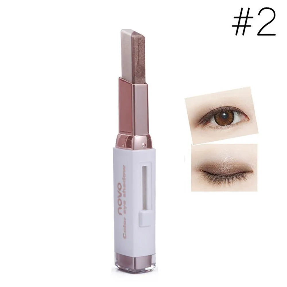 Two-color gradient eye shadow stick with smudge effect and push-button release