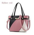 Women's large capacity shoulder bag in black with adjustable crossbody strap and top handle