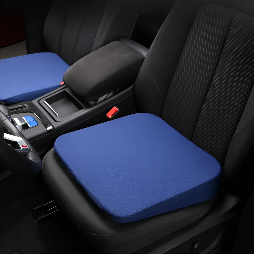 Black car seat cushion measuring 42cm wide by 39cm deep by 6cm thick