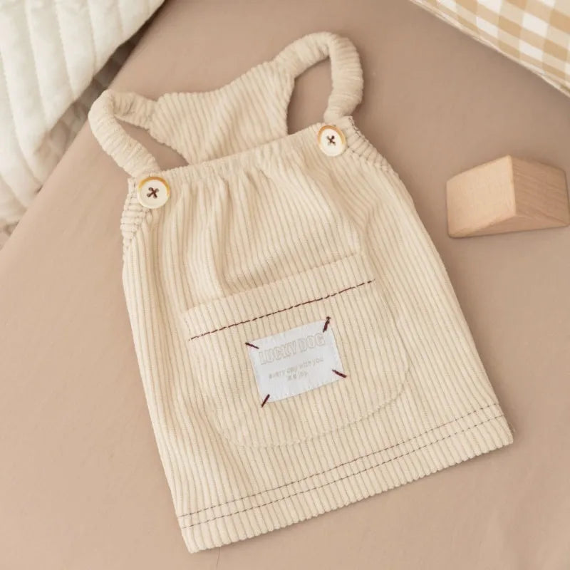 Brown corduroy pet vest with wool Sherpa collar on a small dog, halter design for easy wear