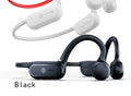 Black air conduction wireless earphone with titanium frame shown bent around a pair of glasses.