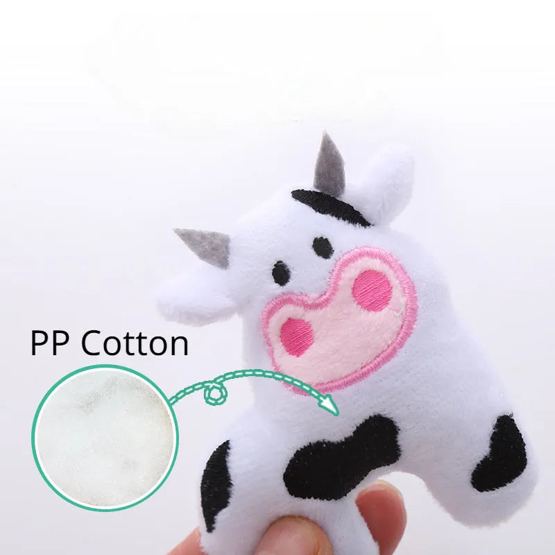 Parrot, cow, and crocodile shaped plush cat toys with catnip for interactive feline play