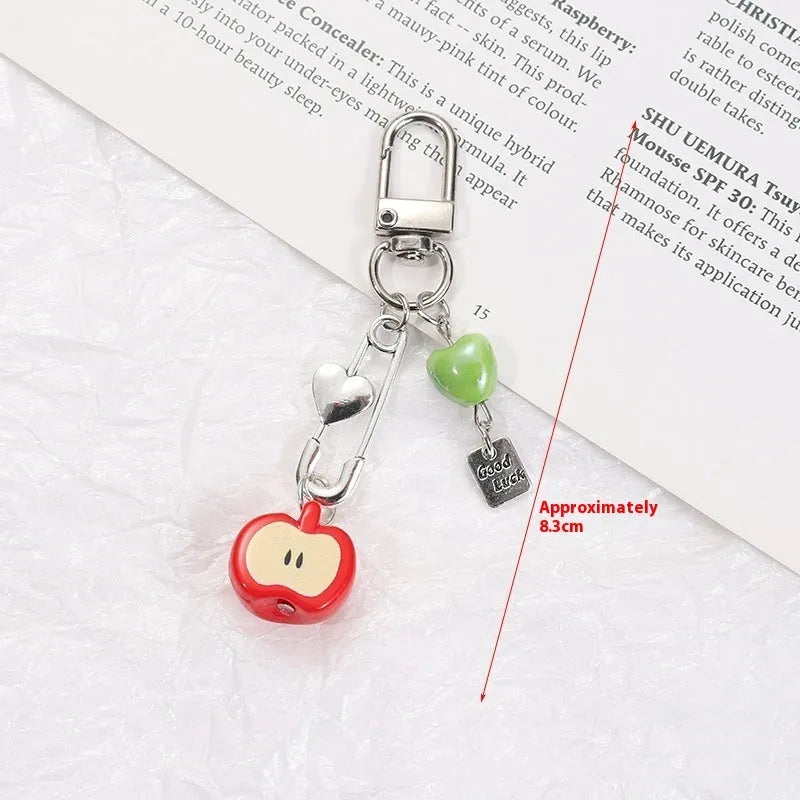 Plastic resin phone charm keychain with semi-handmade apple and strawberry fruit designs