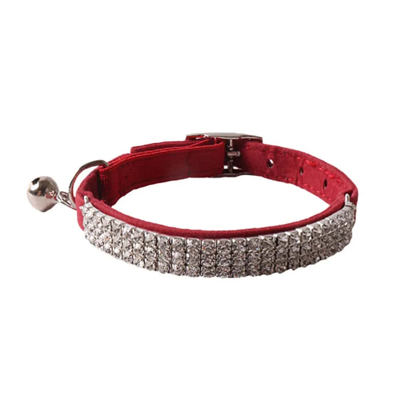 A pink flocked cat collar with an elastic silver buckle, showing its 1.0 cm width and adjustable 28 cm length.