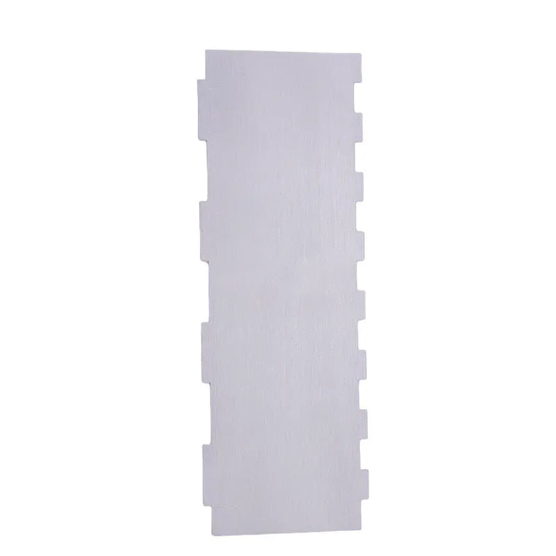 Stainless steel cake decorating scraper with multiple polygon-pattern heads for textured finishes.