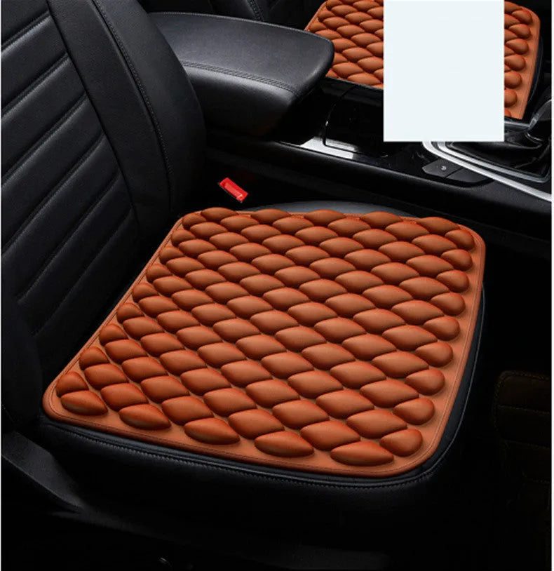 The Pressure Relief Seat Breathes polyester fiber cushion 45x45cm in beige on a chair