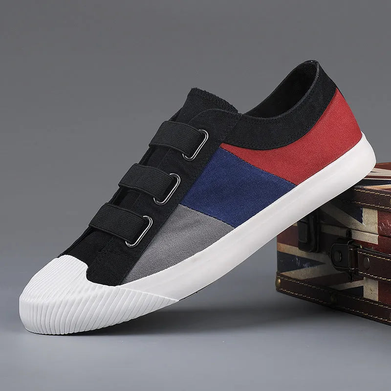 Men's low-top canvas sneakers in beige with colour stitching and an elastic band closure.