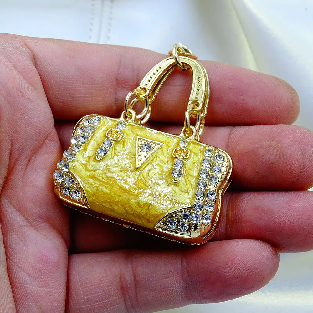 Alloy pendant keychain with enamel diamond cloud pattern in gold colour on keyring