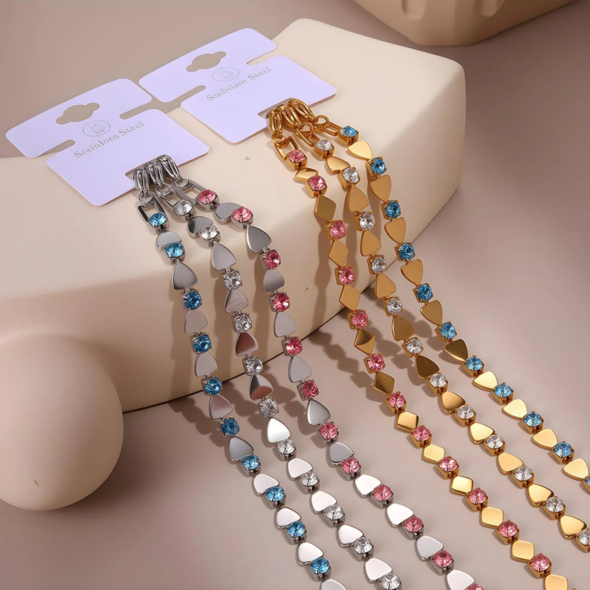Temperamental women's stainless steel bracelet with 18K gold electroplating and geometric zircon accents in multiple colours