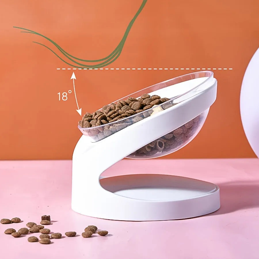 White clear plastic elevated cat food bowl with tilted ergonomic design for neck protection.