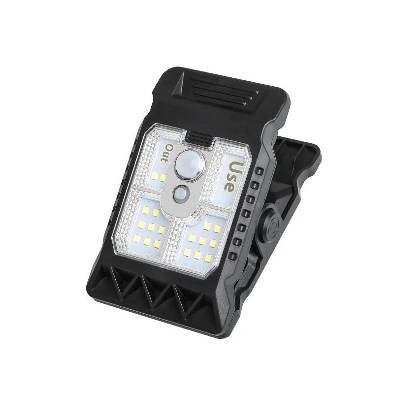 White intelligent induction clip lamp mounted on a wall with motion sensor and LED light visible.