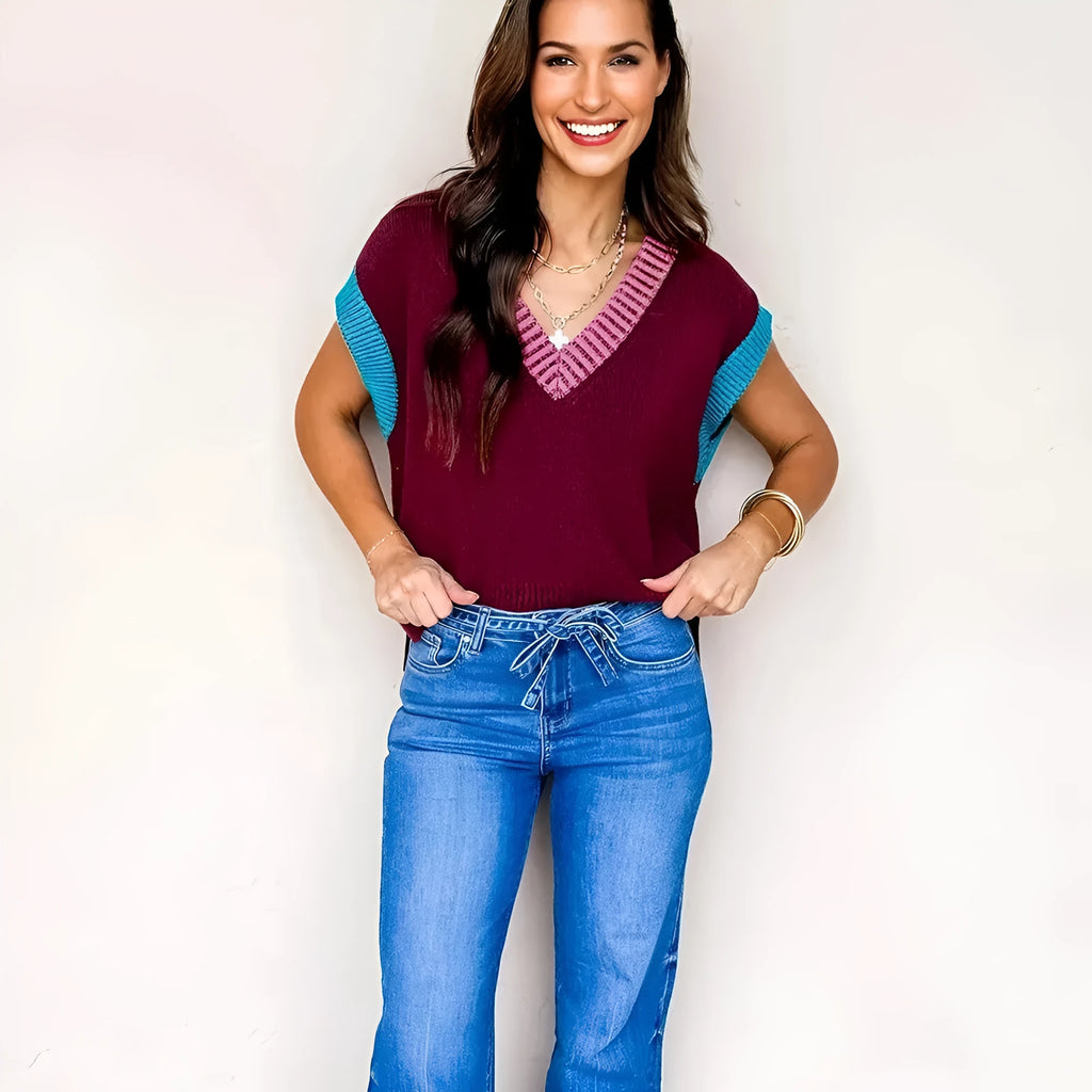 Burgundy women's loose V-neck sweater with cuffed short sleeves and contrast trim detail