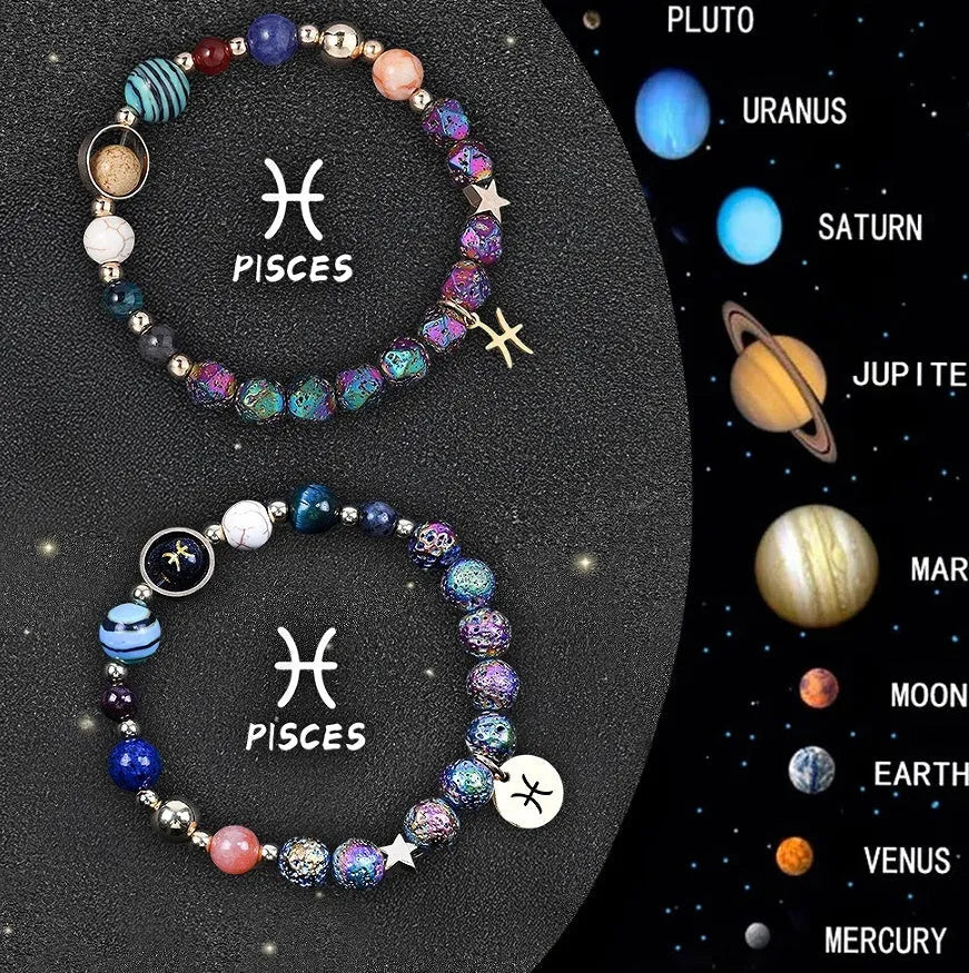 Two natural stone beaded bracelets with adjustable cords on a wooden surface, showing zodiac symbol designs.