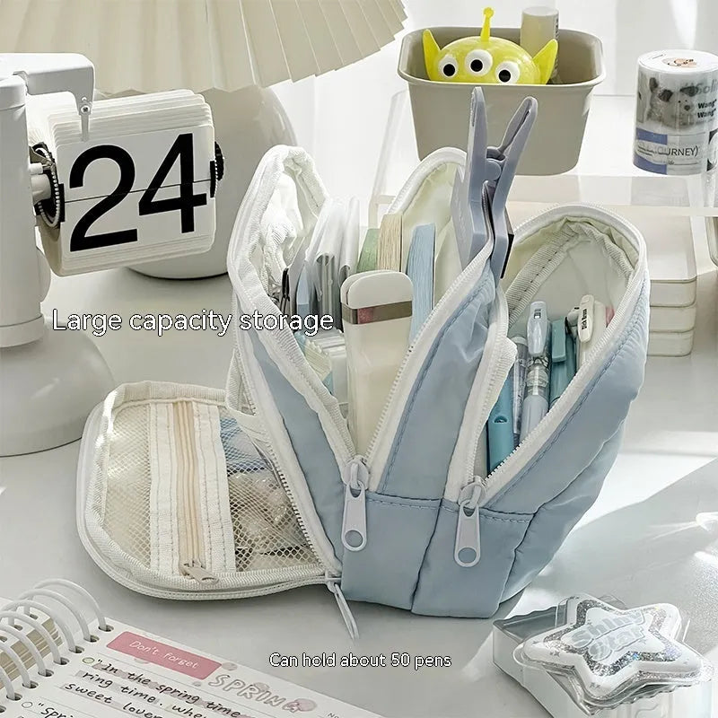 Double layer pencil case in solid colour with gift handle showing interior compartments