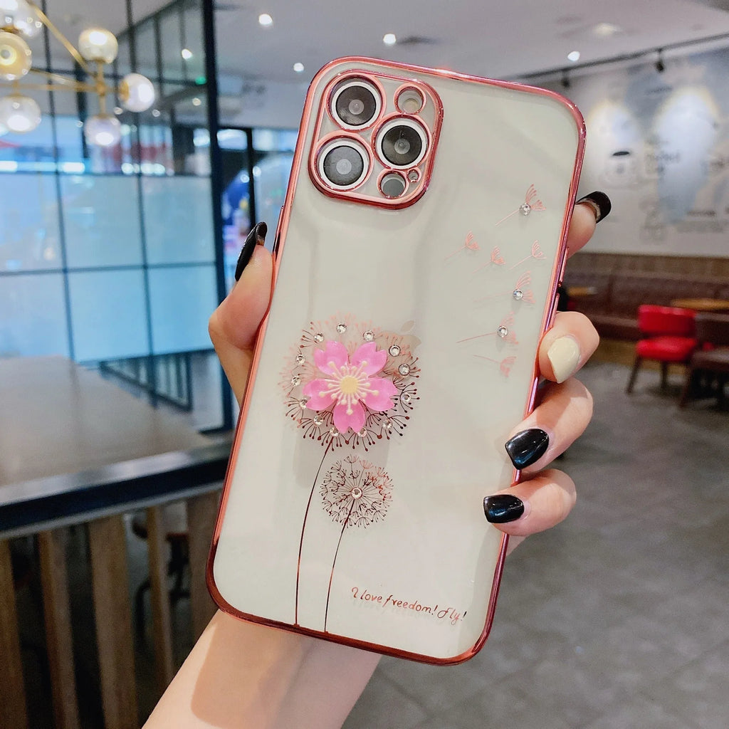 Green iPhone case with a raised 3D purple flower that acts as a spin stand, showing the built-in screen protector.