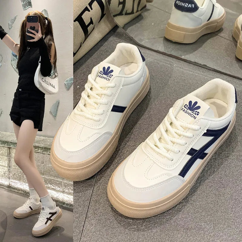 Blue and brown low-top casual board shoes with round toe and flat rubber sole.