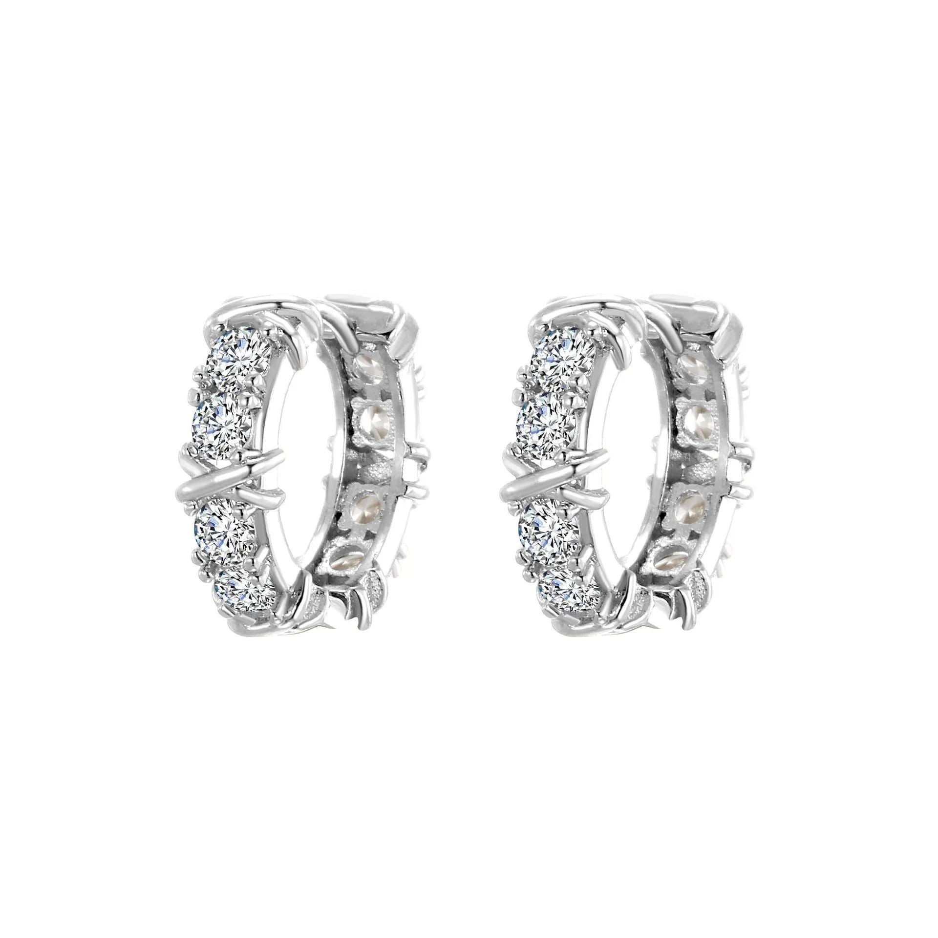 A pair of women's hexagonal geometric earrings with a clover cross design in silver or gold colour.