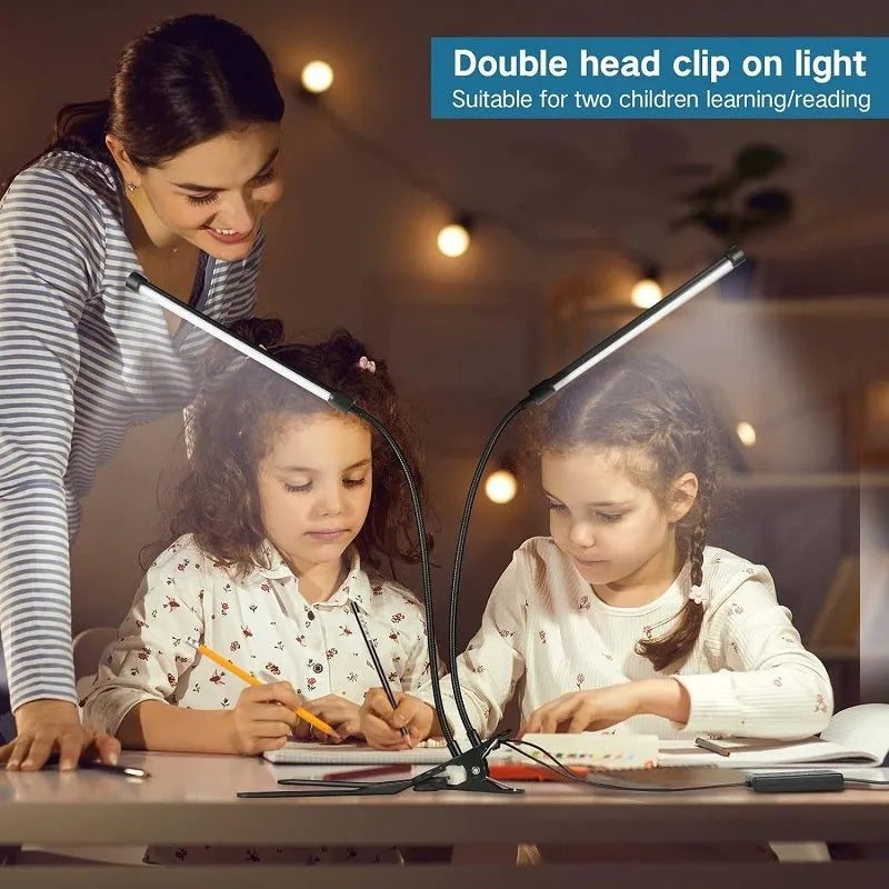 Black and white USB-powered LED desk lamp with 26cm length for study desks.