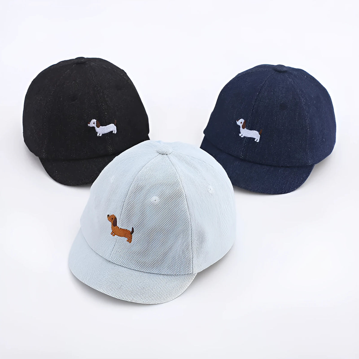 Babies denim puppy baseball cap with short brim and dome crown in light blue, dark blue, or black, 48cm size