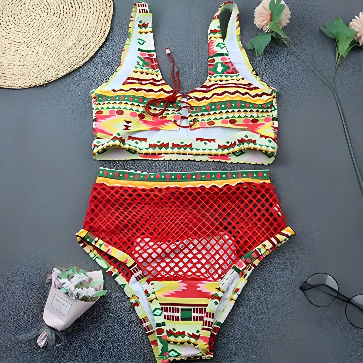 Women's multicolour checkered bikini set with cross-strap top and fishnet high-waist shorts
