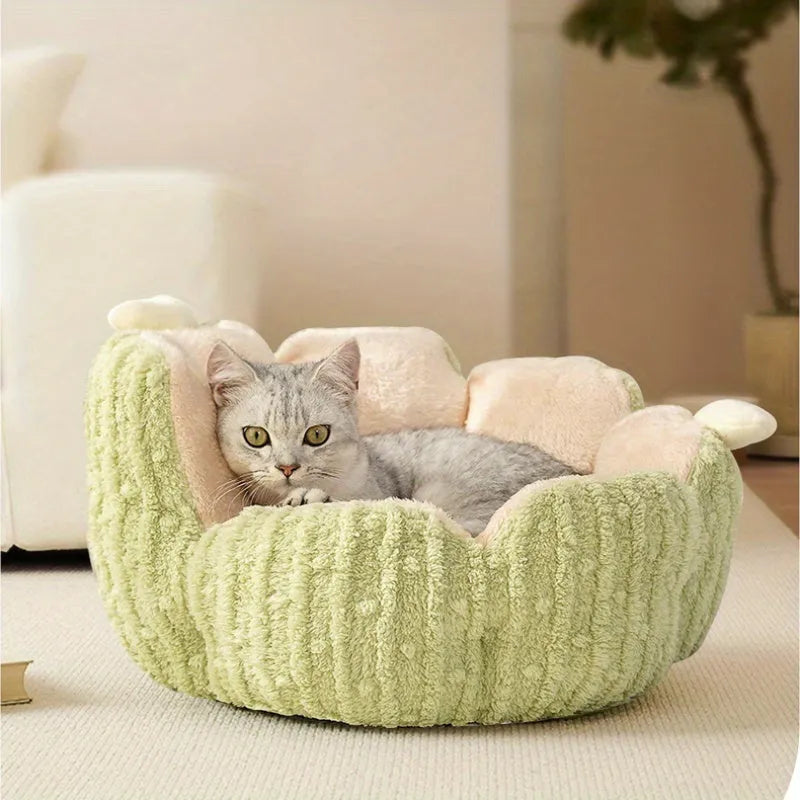 Green cactus design soft pet bed for cats or small dogs on a wooden floor.