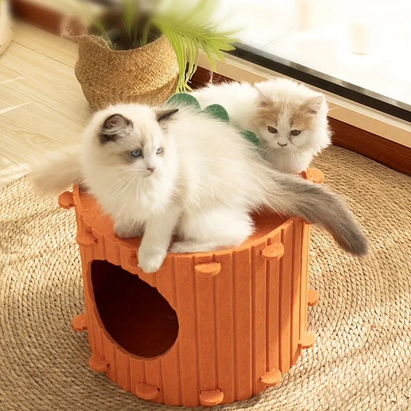 Beige carrot-shaped felt cat nest with multiple holes, shown in a home setting.
