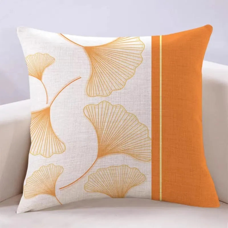 Ginkgo leaf printed square cushion cover on a sofa, available in multiple colours and sizes