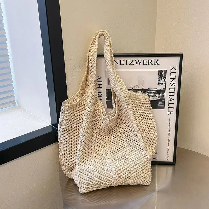 Hand-woven hollow shoulder bag in cotton and linen, beige colour, open pocket design with double straps
