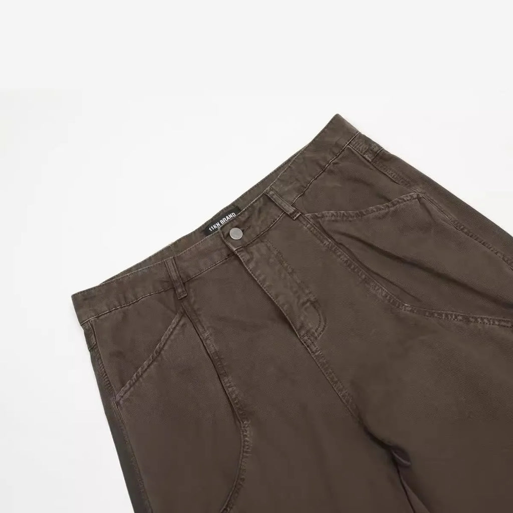 Men's brown loose straight leg trousers with high waist and zip fly
