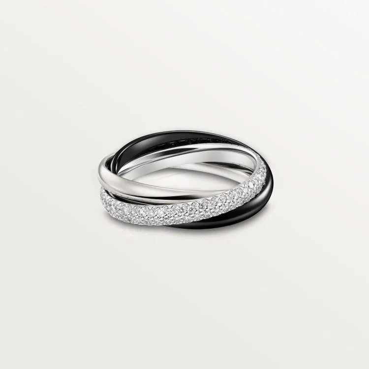 Sterling silver couple's ring with full diamond setting and geometric design on a size 8 finger.