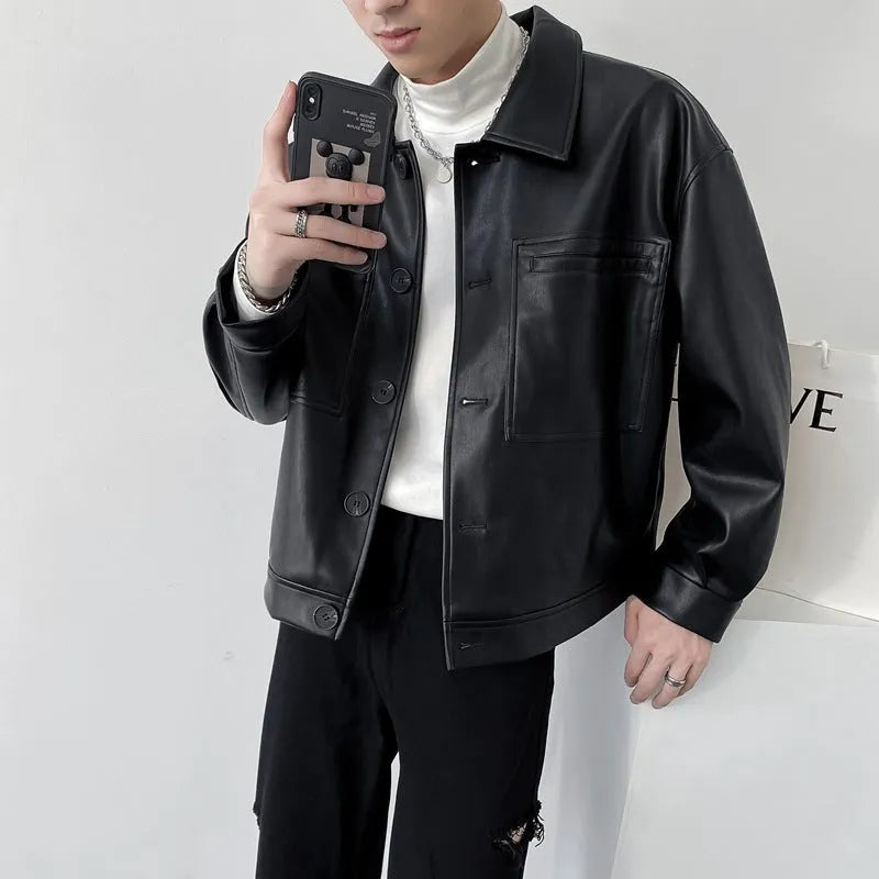 Men's short PU leather jacket with retro lapels, ruffle detailing, and side seam pockets in brown colour