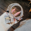Three-dimensional butterfly USB cable protection sleeve for Apple 20W charger with silver foil square sleeve and electroplated rope detailing