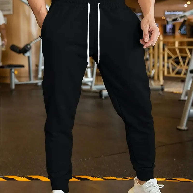 Men's linen-style trousers with elastic drawstring waist in loose fit design