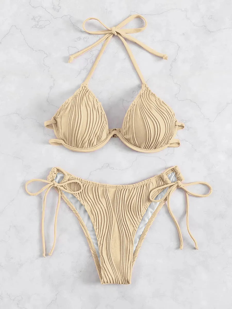 Women's apricot coloured bikini set with underwire cups and adjustable ties.