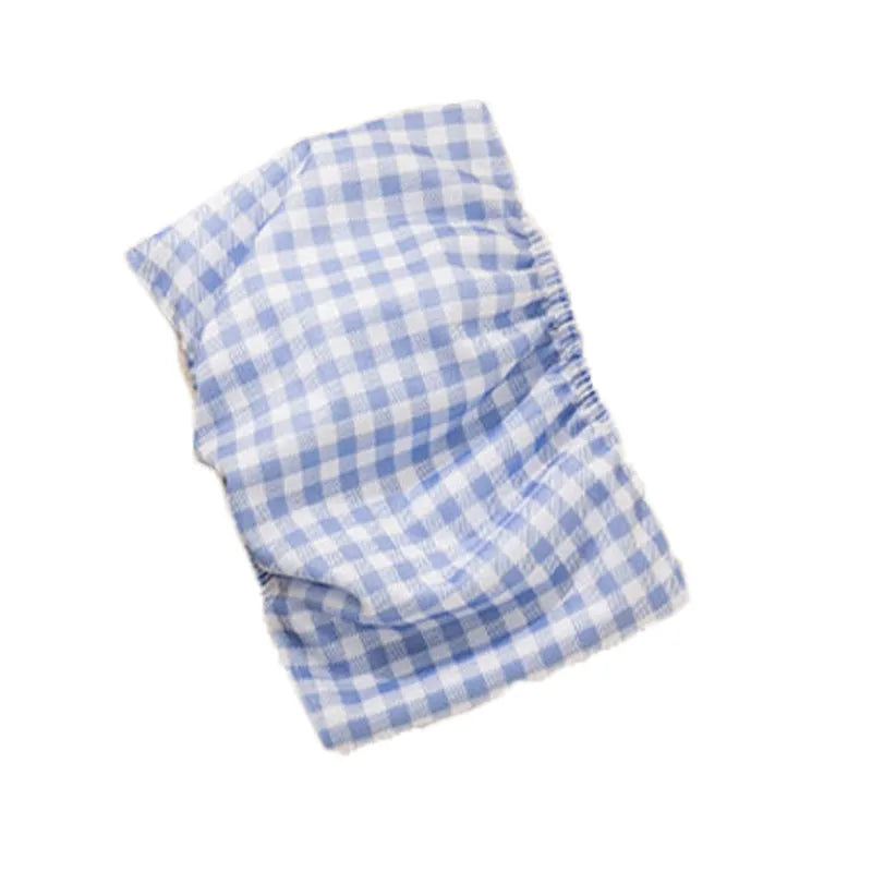 Reusable cartoon bone print dog diaper with fastener tape and elastic waistband, shown in blue bear pattern.