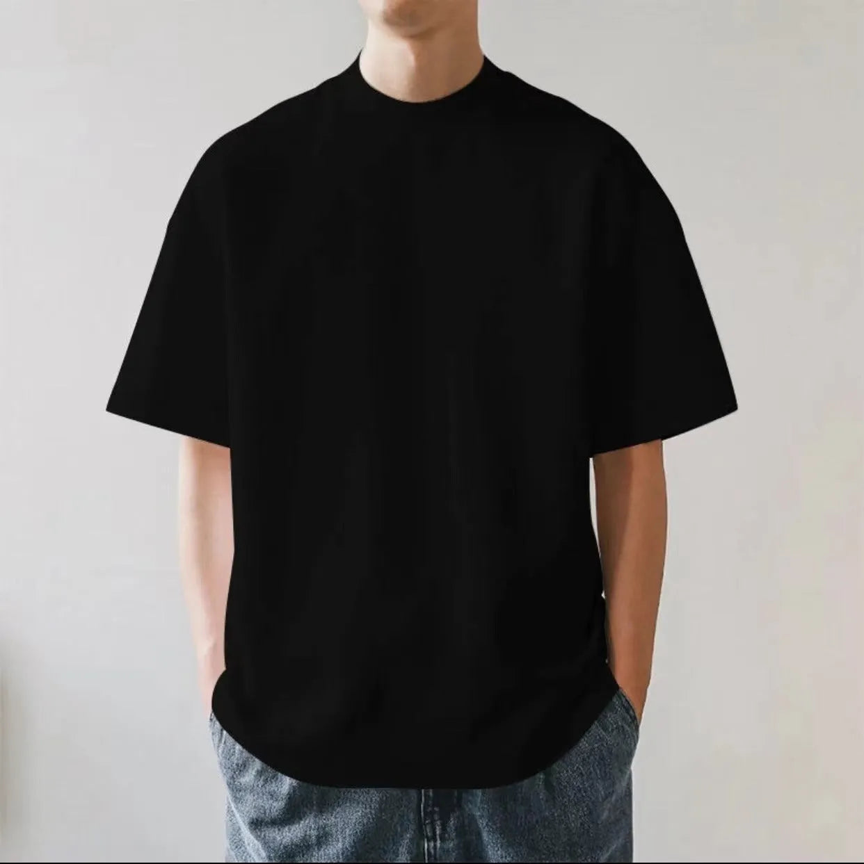 Plus size men's oversized solid colour cotton T-shirt in Ivory White with loose fit and short sleeves