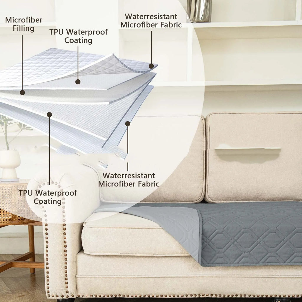 Double-sided waterproof pet sofa cushion with contrast colour panels shown in dark grey and light grey