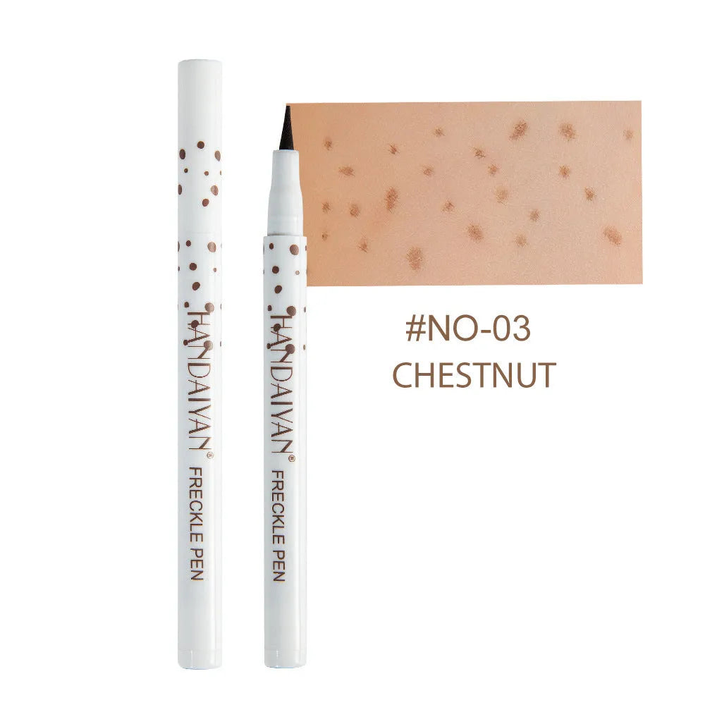Dark brown waterproof freckle pen with precision tip for natural-looking cosmetic freckles.