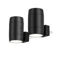 Small white plug-in induction night lamp with a rotatable head on a dark background.