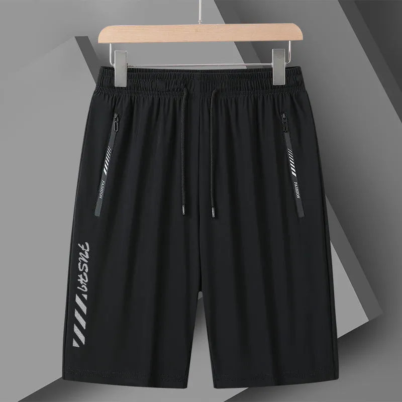 Men's quick-drying nylon sports shorts in loose fit with medium elastic waistband