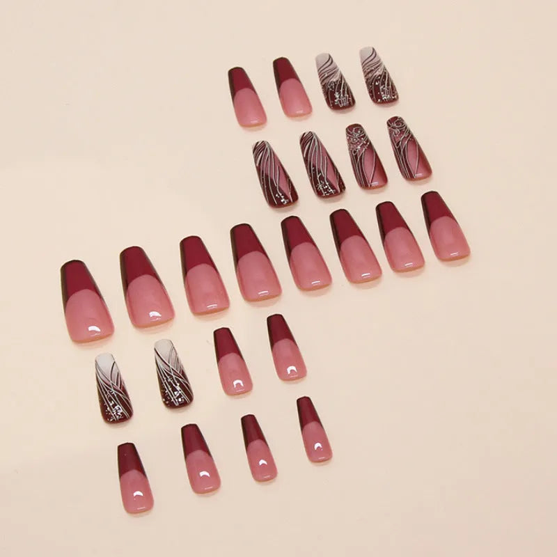 French line pattern false nails and adhesive glue on white background.