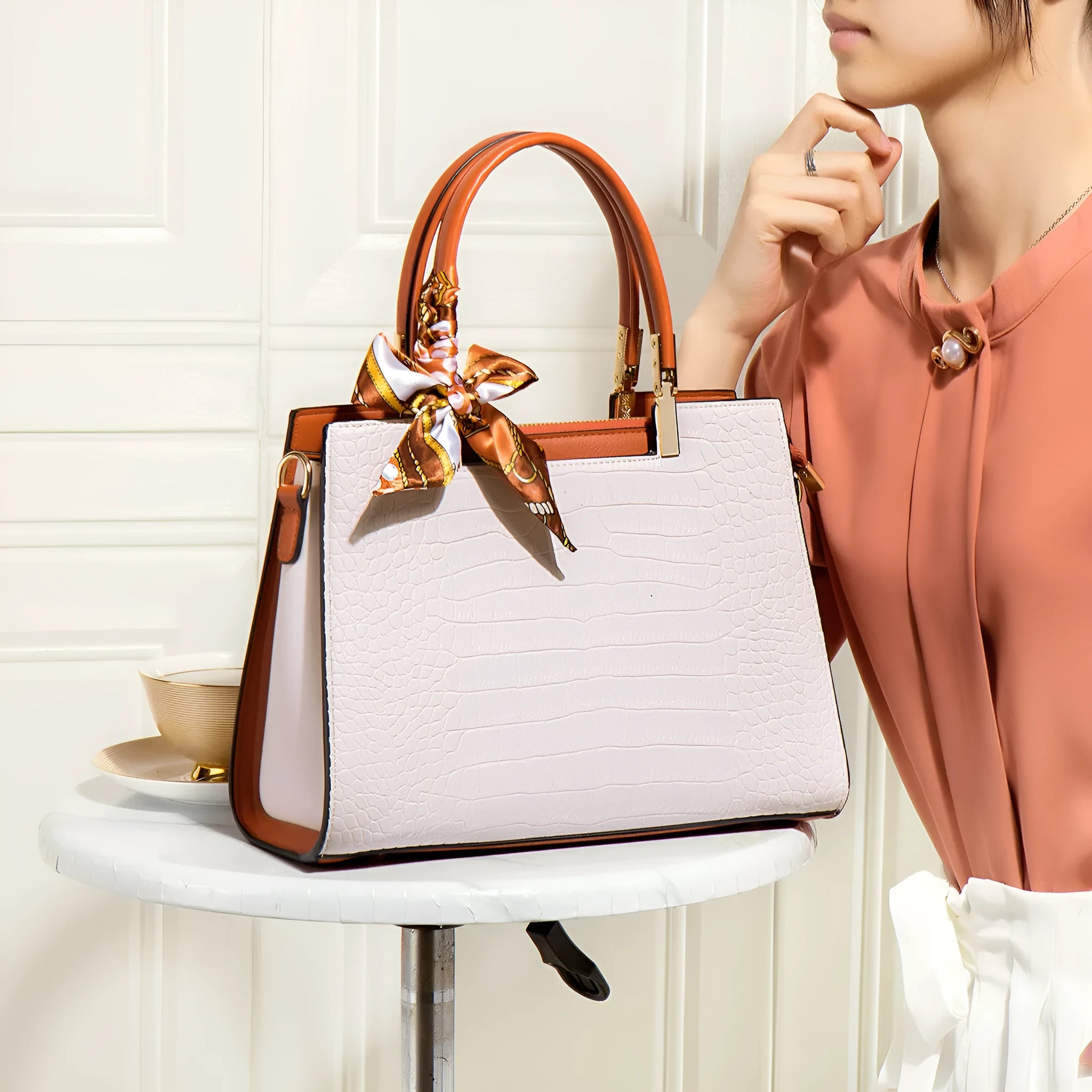 Milk white women's PU shoulder handbag with horizontal square shape and sewing line detail.